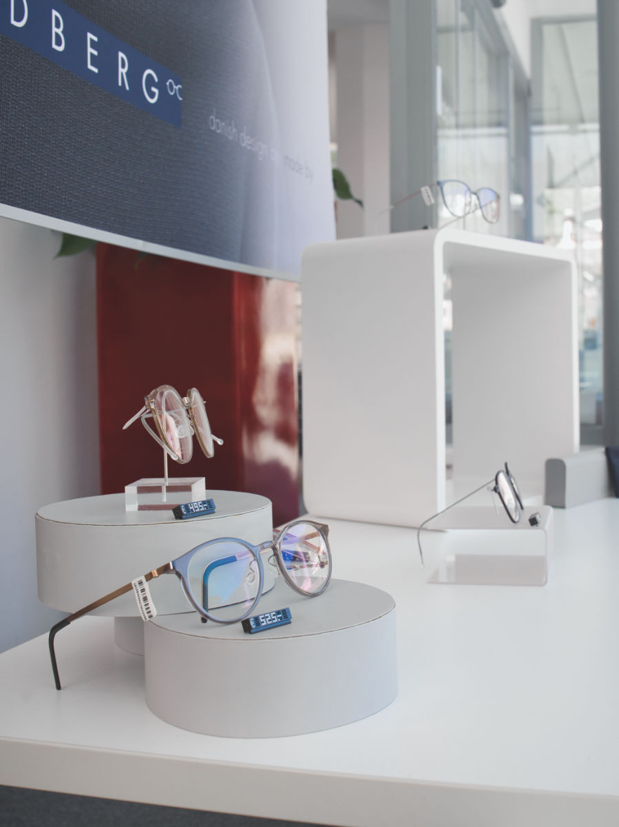 Side view of LINDBERG eyewear on display at Optik Maurer - light, elegant design.
